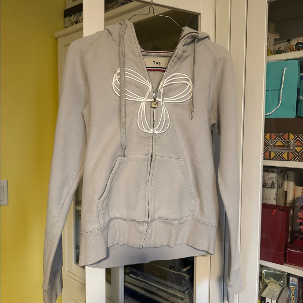 Aritzia TNA Gray Zip-Up Hoodie with Embroidered Design